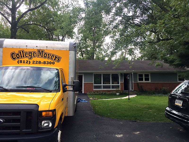 Our new house with the moving truck parked in front